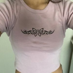 Baby pink crop top with black colored butterfly. Womens XS.